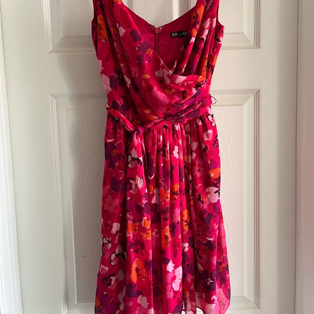 Floral chiffon dress with surplice top and sash.